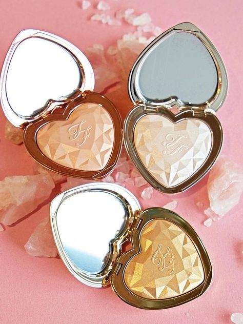 Too Faced heart highlighters are coming. That's right, Too Faced is launching brand-new, oh-so-sweet powders to give you an otherworldly glow in seriously pretty packaging. Zombie Make Up, Too Faced Highlighter, Alat Makeup, Make Up Cosmetics, Old Makeup, Beauty Make-up, Make Up Remover, High End Makeup, Too Faced Makeup