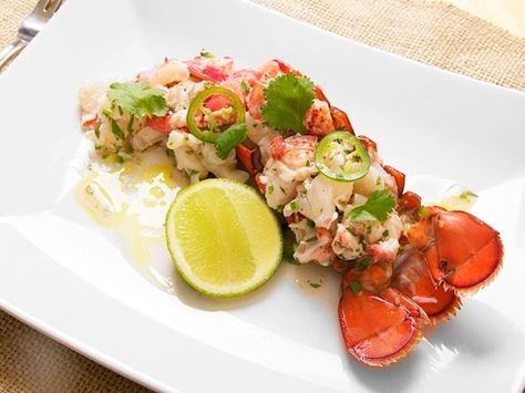 The first time I had lobster ceviche in this style was off of a boat in Cartagena, on the Caribbean coast of Colombia. At each stop we saw two men in a small canoe. The same two men, one with a rainbow umbrella attached to his hat to ward off the sun, the other hunched over the bottom of the canoe, tending to a live fire burning in the middle of it.\n\nI can't pretend to be able to do what they do—lobster diving and canoe-fire-building are not my areas of expertise—but I often make my own... Lobster Ceviche Recipe, Spiny Lobster Recipe, Lobster Ceviche, Lobster Festival, Fancy Picnic, Mexican Fish, Lobster Recipe, Spiny Lobster, Lobster Dishes