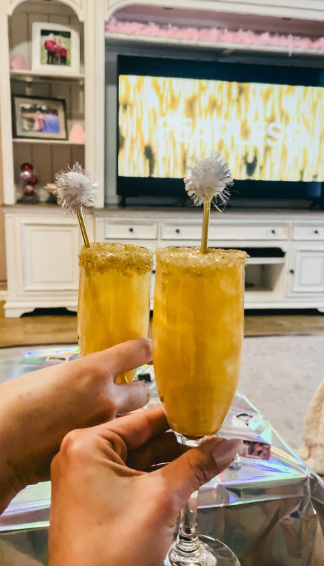 TAYLOR SWIFT ERAS TOUR COCKTAIL PARTY Taylor Swift Fearless Cocktail, Eras Tour Cocktails, Taylor Swift Inspired Cocktails, Taylor Swift Cocktails, Taylor Swift Eras Tour Concert, Boojum Tree, Grapefruit Mimosa, Edible Gold Glitter, Easy Cocktail Recipes