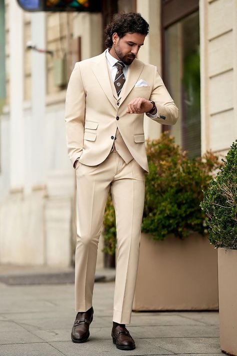 Tailored for the modern gentleman, the Beige Slim-Fit Suit 3-Piece combines elegance with a contemporary edge. Its sleek fit and neutral tone ensure you look polished and professional in any formal setting.

#formalsuit #mensfashion #tailoredstyle #modernsophistication #gentlemanslook #elegantattire #beigesuit #slimfitsuit #refinedstyle #menswear Bow Tie Suit, Modern Fit Suit, Suit Styles, Cream Suit, Suit Stores, Vest And Pants, Slim Fit Suit Men, Beige Suits, Tuxedo Blazer