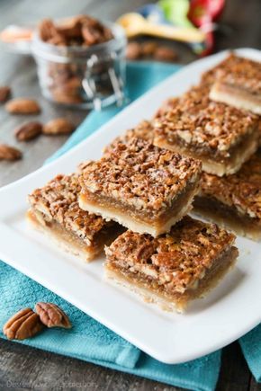 Pecan Pie Bars are made with an easy shortbread crust and delicious pecan pie filling. A crowd-pleasing Thanksgiving or Christmas dessert that will serve many guests. Easy Shortbread Crust, Pistachio Pudding Cookies, Easy Shortbread, Bars Dessert, Pecan Pie Filling, Pecan Bars, Pecan Pie Bars, Spiced Pecans, Dessert Bar Recipe