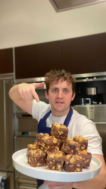 Jon Watts on Instagram: "Cadburys Crunchie Tiffin 😍 Super easy to make, here’s what you’ll need: 160 g Golden syrup 130 g Butter 200 g Milk chocolate 200 g Dark chocolate 70% 150 g Digestive biscuits 100 g Raisins 150 g Cadbury’s Crunchie For the topping: 300 g Milk chocolate 150 g Cadbury’s Crunchie Check out my website for the full written recipe! 🙌 Have a go, and let me know how you get on! ❤️ #cadburys #crunchie #tiffin #chocolate #recipe" Cadbury Recipes, Chocolate Fan, Digestive Biscuits, Cook Up A Storm, Golden Syrup, Main Meals, Milk Chocolate, Main Dish Recipes, Tray Bakes