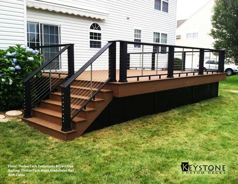 TimberTech Evolutions Brown Oak decking with TimberTech Black Evolutions Rail with Cable. Built by Keystone Custom Decks. Pergola Vines, Pergola Metal, Deck Skirting, Deck Railing Design, Black Deck, Deck Pictures, Patio Deck Designs, Deck Designs Backyard, Deck With Pergola