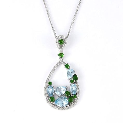 Step into a world of elegance with our teardrop shape multi-gemstone rhodium over sterling silver pendant, a piece that embodies both luxury and a rich display of colors. The pendant showcases a harmonious assembly of gemstones, featuring white topaz, a series of round and marquise chrome diopside in varying sizes, and a selection of pear and oval sky blue topaz. Heart Shaped Solitaire Ring, Oval Three Stone Ring, Round Solitaire Rings, Gemstone Pendant Necklace, Fashion Pendant, Sky Blue Topaz, Bridesmaid Necklace, Gemstone Necklace Pendant, Crystal Necklace Pendant