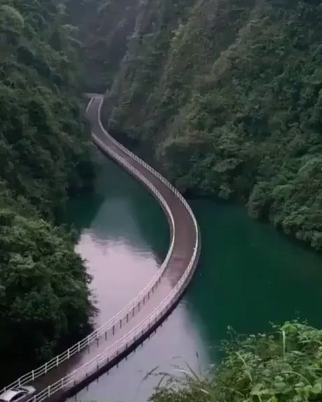 Floating bridge in China’s Hibei province. Floating Bridge, Allergy Recipes, Water Sprinkler, Winding Road, Humor Memes, Short Cut, Interesting Photos, A Bridge, Incredible Places