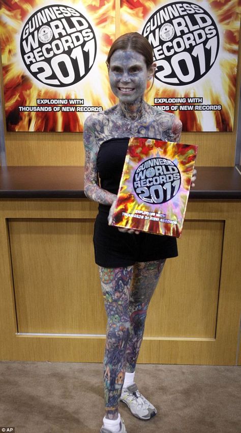 Miss Gnuse features in the 2011 Guiness World Records book; very interesting article to read! Mid 30s, Interaktives Design, Illustrated Ladies, Tattooed Woman, Guinness Book Of World Records, Guinness Book, Guinness World Records, Tattoo Removal, Mom Tattoos