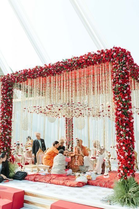 Weddings, Indian Wedding Planning Online - WedMeGood Simple Chori Decoration Wedding, Indian Wedding Setup, Simple Wedding Mandap Decor, Indian Barn Wedding, Mandap Decoration Wedding, Indian Wedding Venue Ideas, Simple Haldi Decor, Wedding Decorations Indian Stage, Vidhi Mandap Indian Weddings