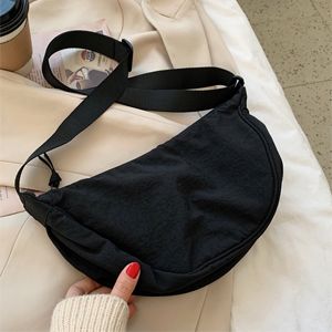 Size approx 12.2"(L)*3.5"(W)*6.3"(H). This crossbody bag consists of one compartment with patch pockets, can hold daily supplies such as makeup, phone, keys, etc. Roomy space to store your essentials. Crossbody Bag Outfit, Diy Tote, Nylon Crossbody Bag, Dumpling Bag, Bag Outfit, Hobo Crossbody Bag, Women Crossbody Bag, Girls Handbags, Bag Dress