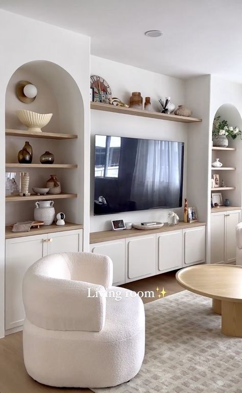 Modern Spanish Tv Room, Oval Built In Shelves, Arched Bookcase With Tv, Media Wall With Arch, Niche Tv Wall, Tv Wall With Niches, Arch Wall Built In, Living Area Tv Wall Design, Built In Arched Shelves Living Room