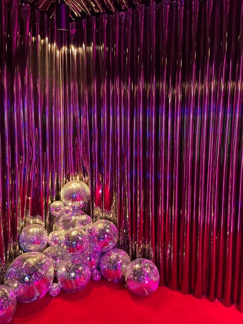 Art installation, disco balls, red, pink, parade, shiny, purple, New York City, soho, store, design Disco Ball Stage Design, Red Disco Party, Disco Ball Photo Backdrop, Ball Art Installation, Disco Color Palette, Disco Ball Installation, Disco Bedroom, Disco Backdrop, Disco Colors