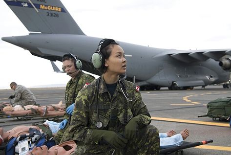 Royal Canadian Air Force Capt. Kathleen Nguyen, a 1st Canadian Field Hospital critical care nurse, practices treating simulated patients as part of an aeromedical evacuation scenario during exercise Mobility Guardian at Fairchild AFB, Wash. Photo: SrA. Charles Fultz Air Force Lifestyle, Army Nurse Aesthetic, Royal Air Force Aesthetic, Military Nurse Aesthetic, Air Force Medic, Military Nurse, Air Force Nurse, Air Force Love, Critical Care Nurse