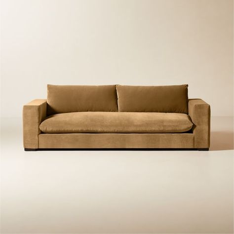 Upholstered in a lush copper performance velvet, large-scale sofa sits low to the ground with pillow-like detached cushions and wide arms for modern appeal. French seams add a tailored finish. Combine with other Deseo sectional pieces for a configuration that suits your space. CB2 exclusive.  -Frame is hand-assembled in America using kiln-dried engineered wood to prevent warping over time -Hand-pulled sinuous wire spring suspension ensures a comfortable and supportive sit -Crypton r performance Sectional Sofa Sale, Livng Room, Brown Sofa Living Room, Microfiber Couch, Velvet Sectional, Brown Couch, Velvet Couch, Sofa Review, Armless Loveseat