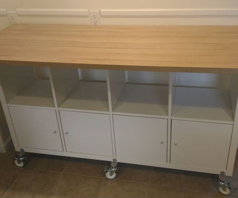 My wife and I were looking for some extra storage and a place to sit down in our kitchen. It's not a large room, but it has one empty ~6.5' wall, so we figured we... Moveable Kitchen Island, Moveable Island, Ikea Instructions, Kallax Shelf Unit, Portable Workbench, Kallax Shelf, Kallax Ikea, Shelf Unit, Diy Home Improvement