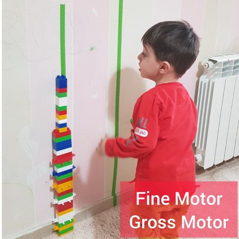 Make different length lines on the wall with paper tape. Kids stack Lego pieces on top of each other to the length of the paper tape. This activity improves fine and gross motor skills and it's great for their focus. You can talk about length and emphasis on corresponding vocabulary like long, longer, short and shorter. Stacking Activities For Preschoolers, Longer And Shorter Activities, Tall And Short Activity, Tall And Short Activities Preschool, Long And Short Activities Preschool, Toddler Gross Motor Activities, Nursery 2024, Ece Activities, Maths Fun