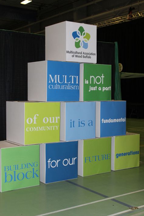 To create an eye catching entrance on a limited budget we created these 'building blocks' with a special message from the non profit to set the tone for the event Non Profit Booth Ideas, Conference Decorations Events Ideas, Conference Entrance Design, Business Conference Decor, Corporate Decor Events, Corporate Event Decor Entrance, Corporate Event Stage Design Ideas, Conference Decorations Events, Event Ideas Creative