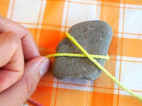 lovely yarn wrapped rocks to make with kids Rock Weaving, Stone Wrapping Tutorial, Stripey Socks, Rock Wrapping, Acorn Art, Wrapped Rocks, Snake Crafts, Chicken Wire Crafts, Wrapped Stones