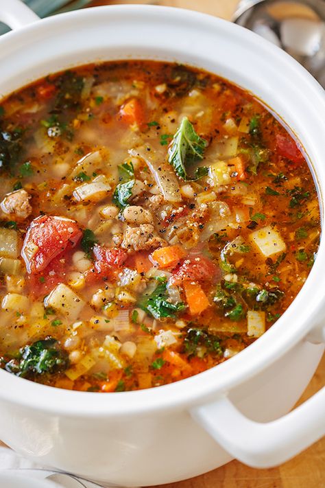 This Italian vegetable soup with spicy sausage is deliciously rich and brothy, made extra hearty with a spoonful of tender gnocchi! | thecozyapron.com #italianvegetablesoup #italianvegetablesouprecipe #italianvegetablesouprecipes #italianvegetablesouphealthy Italian Sausage And Gnocchi, Italian Vegetable Soup, Spicy Italian Sausage, White Bean Soup Recipes, Italian Sausage Recipes, Bean Soup Recipes, Sausage Soup, Spicy Sausage, Savory Soups