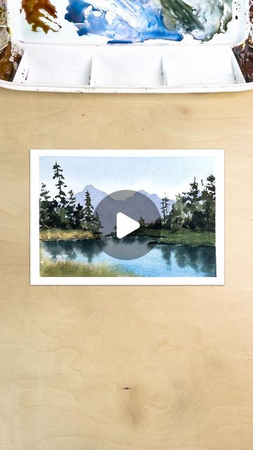 Dani (Daria) on Instagram: "Watercolor timelapse painting of a lake in the mountains🌲 Landscape paintings like this are always a joy to paint. I love the calmness and the feeling of serenity of this scene. If you want to attempt this painting, make sure you let the layers dry in between. These are the main steps: 1. Wet on wet: sky, lake, foreground, land. 2. Let dry. 3. Wet on dry: mountains, darker land, trees, shadows on the land area. 4. Let dry. 5. Re-wet the lake with clean water. 6. Drop in reflections. 7. Finishing touches, And you’re done! Happy painting🥰 More watercolor tutorials: #daniwatercolors_tutorials . . . . #watercolortutorial #watercolortips #watercolorforbeginners #watercolorlandscape #watercolorhowto #watercolortutorialvideo #watercolortechnique #howtopaint Watercolor Mountain Landscape Tutorial, Watercolor Reflections In Water, Mountain Painting Tutorial, Watercolor Mountains Tutorial, Watercolor Timelapse, 2023 Watercolor, Sky Lake, Basic Watercolor, Happy Painting