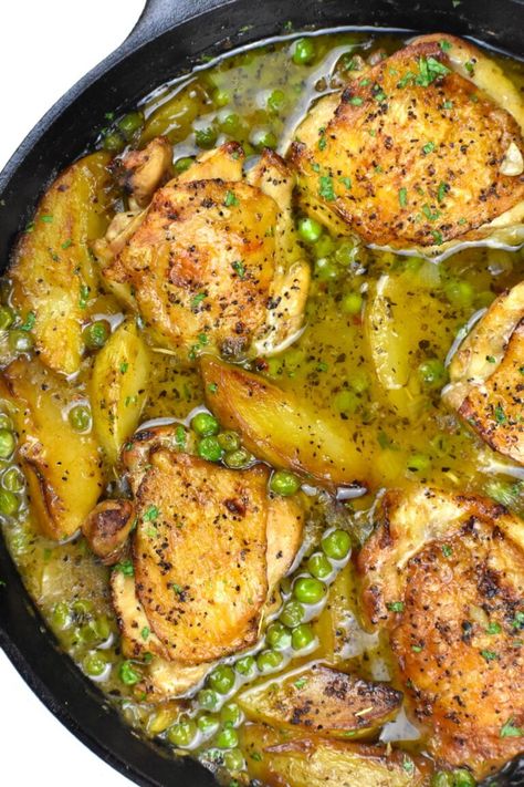 Chicken Vesuvio is a restaurant-quality dish from Chicago, where chicken a potatoes braise in a flavorful sauce, along with the final addition of peas.