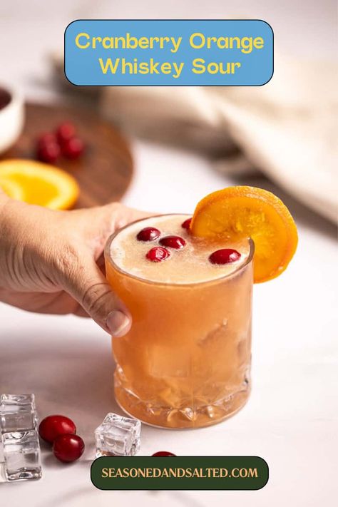 Easy Cranberry Orange Whiskey Sour Cocktail Recipe Orange Whiskey Sour, Whiskey Sour Cocktail, Triple Sec Cocktails, Festive Cocktail Recipes, Sour Cocktail, Festive Cocktails, Whiskey Sour, Whiskey Drinks, Whiskey Cocktails