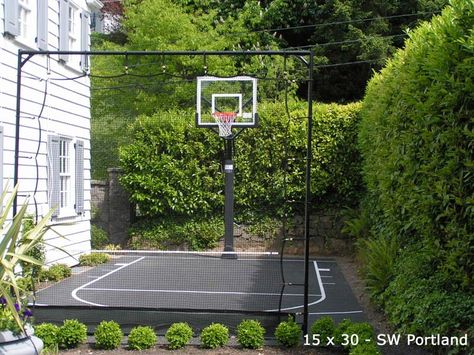 Basketball doesn't have to be played on the driveway or a full size basketball court - Sport Court St. Louis can build a backyard court to fit any space in your yard. Backyard Court, Home Basketball Court, Basketball Court Backyard, Backyard Basketball, Backyard Sports, Outdoor Basketball Court, Privacy Landscaping, Side Yards, Backyard Privacy