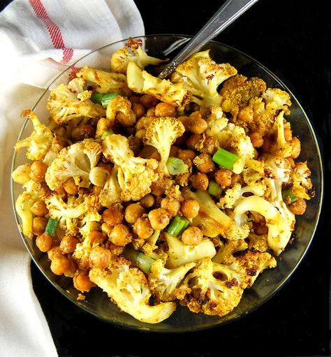 Roasted Cauliflower and Chickpeas with Indian spices. V and GF. Indian Spiced Cauliflower, Cauliflower And Chickpeas, Chickpeas Roasted, Roasted Cauliflower Recipes, Spiced Cauliflower, Vegan Cauliflower, Fried Cauliflower, Chickpea Recipes, Holy Cow