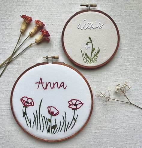 Birth flower name hoops are now available! They are completely customizable and so darling! This name hoop is perfect for any nursery wall, name announcement, baby keepsake and so much more! Did you know what your birth flower is? I only recently found out! #handmade #handembroidered #birthflower #embroidered #handembroideredgifts #embroideryhoopart #embroideryhoopdecor #nurserydecor #nurserydesign #babyshower #babyshowergift #babyannouncement #nameannouncement #genderreveal #babygirl #ba... Birth Flower Embroidery, Name Embroidery Hoop, Flower Embroidery Hoop, Hand Embroidered Gifts, Embroidery Hoop Decor, Name Announcement, 8 Number, Name Embroidery, Flower Names