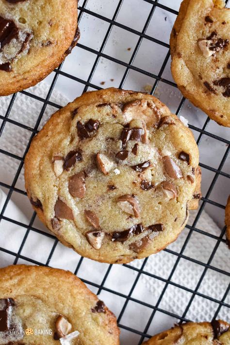 Chewy brown butter chocolate chunk cookies get an upgrade with malted milk powder and chopped Whoppers candy for a sweet and mellow toasted flavor, topped with a sprinkle of sea salt. A great way to use up extra candy, or to switch things up from your typical chocolate chip cookie! Malted Milk Chocolate Chip Cookies, Milk Dud Cookies, Malted Chocolate Chip Cookies, Whoppers Candy Recipes, Malted Cookies, Malt Cookies, Whoppers Candy, Malted Milk Powder, Chocolate Hazelnut Cookies