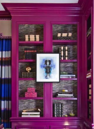 Add some interest to a piece by giving it a glossy, bold finish. "I think you should definitely experiment with color sooner rather than later," designer Lindsey Coral Harper says. Purple Personality, Bookshelves Painted, Pink Bookshelves, Traditional Bookcases, Glamorous Interiors, Zsazsa Bellagio, Built In Bookcase, Funky Furniture, Maximalism