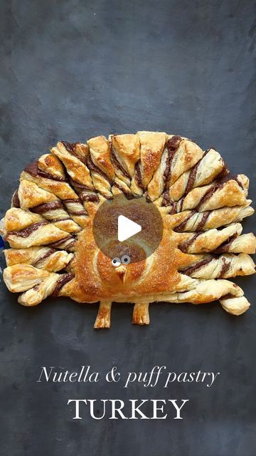 Sarah Fowler on Instagram: "Nutella & puff pastry turkey 🦃 This little guy went completely viral last year and it’s not hard to see why! How cute is he?? This is also super easy to throw together and makes the perfect little grab-and-go snack while the real turkey is in the oven on Thanksgiving day.

Note: you can make these cute turkeys with savory spreads if you prefer, we also love it with basil pesto or Boursin cheese!

Ingredients
2 sheets puff pastry, thawed
1/3 cup Nutella
1 egg, beaten
1 tbsp Turbinado sugar (optional but I like the crunch!)

Directions
Heat oven to 400°. Lay out one of the sheets of puff pastry on parchment paper and spread Nutella on top, leaving the corners plain. Lay the second sheet on top. Cut into a semi circle and set aside the excess pastry (you’ll use th Nutella Turkey Puff Pastry, Puff Pastry Thanksgiving Dessert, Nutella Turkey, Puff Pastry Turkey, Savory Spreads, Nutella Puff Pastry, Puff Pastry Desserts, Nutella Spread, Thanksgiving 2024