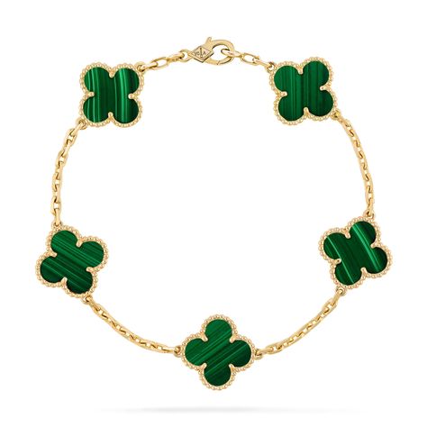 Faithful to the very first Alhambra® jewel created in 1968, the Vintage Alhambra creations by Van Cleef & Arpels are distinguished by their unique, timeless elegance. Inspired by the clover leaf, these icons of luck are adorned with a border of golden beads. Vintage Alhambra bracelet, 5 motifs, 18K yellow gold, malachite. Malachite Van Cleef, Van Cleef Bracelet Gold, Van Cleef Malachite, Van Cleef Alhambra, Van Cleef Bracelet, Cleef Bracelet, Vintage Alhambra Bracelet, Alhambra Bracelet, Classy Purses