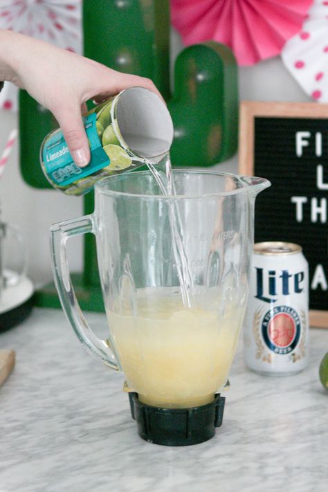 This is our favorite margarita recipe that is perfect for a hot summer day! It combines tequila, lime, and beer for the perfect frozen margarita recipe. So easy and so refreshing for the summertime or cinco de mayo! #margarita #frozenmargarita #recipe #margaritarecipe #cocktail #summer Margarita With Beer And Limeade, Margarita With Limeade Frozen, Beer Margaritas With Limeade, Easy Margarita Recipes Frozen, Margarita Party Ideas Decorations, Easy Margarita Recipes For A Crowd, Margarita With Limeade, Frozen Limeade Margarita Recipe, Frozen Margarita Recipes