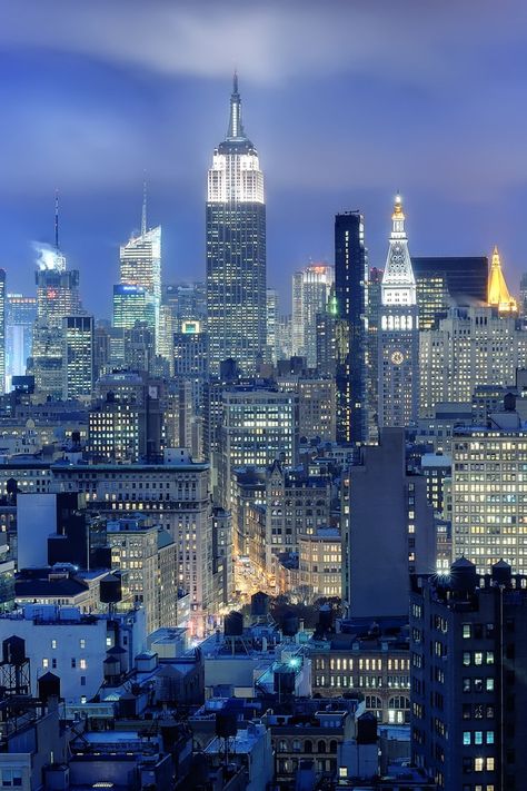 Blue buildings in the emerald city! Korean Apartment, Voyage New York, City At Night, Ellis Island, City That Never Sleeps, City Apartment, Night City, City Aesthetic, New York State