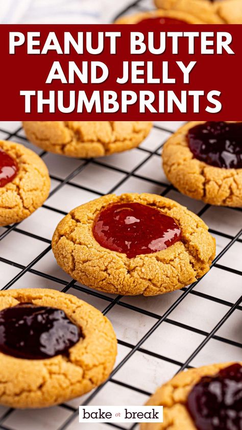 Chewy peanut butter cookies and your favorite fruit preserves combine to make these easy peanut butter and jelly thumbprint cookies! Holiday Peanut Butter Cookies, Peanut Butter Jelly Thumbprint Cookies, Peanut Butter And Jelly Thumbprint Cookies, Jelly Thumbprint Cookies, Peanut Butter And Jelly Cookies, Peanut Butter Jelly Cookies, Thumbprint Cookies Easy, Peanut Butter Thumbprint Cookies, Jam Thumbprint Cookies