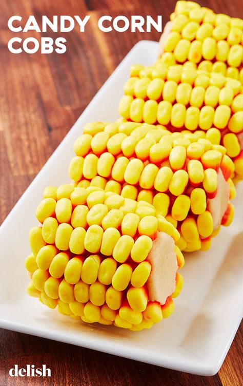 Your eyes ARE deceiving you—there's sugar cookie dough inside there! Get the recipe from Delish.com. #candy #corn #cobs #cookie #desserts #halloween #treats Candy Corn Recipe Ideas, Corn Cob Recipe, Corn Party Ideas, Candy Corn Cob, Candy Corn Ideas, Corn Recipes Cob, Edible Sugar Cookie Dough, Candy Corn Sugar Cookies, Candy Corn Recipe