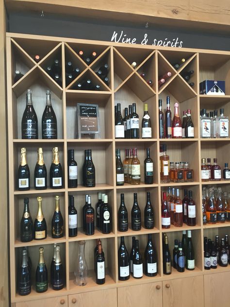 Wine And Spirits Shop Design, Liquor Store Design Interiors, Bar Shelves Ideas, Backyard Storage Buildings, Wine Store Display, Wine Store Design, Bar Lounge Design, Liquor Shop, Grocery Store Design