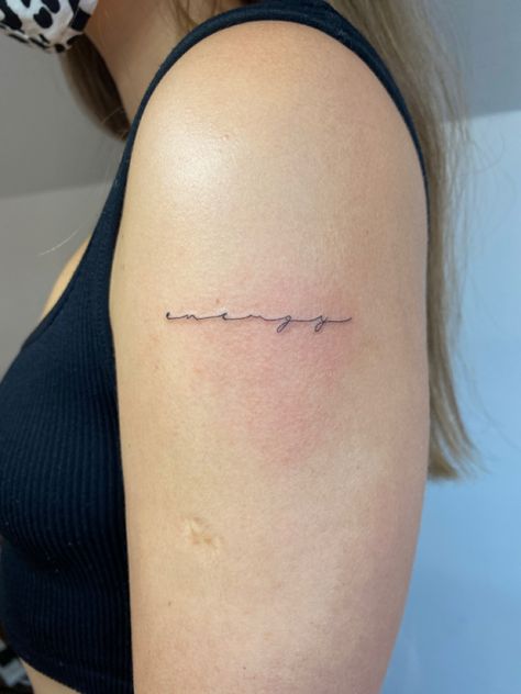 Dainty Tattoo Writing, Fine Writing Tattoo, Cursive Minimalist Tattoo, Cursive Line Tattoo, Upper Arm Word Tattoo, Spaced Out Cursive Font Tattoo, Energy Word Tattoo, Fine Line Word Tattoo Arm, Line Writing Tattoo