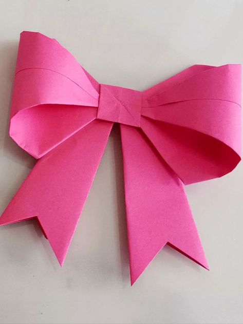 How to make an origami bow tie for gift Bow With Wrapping Paper, Origami Ribbon, Bow With Ribbon, Make Bows, How To Fold, Gift Ribbon, Square Paper, Colored Paper, How To Make Bows