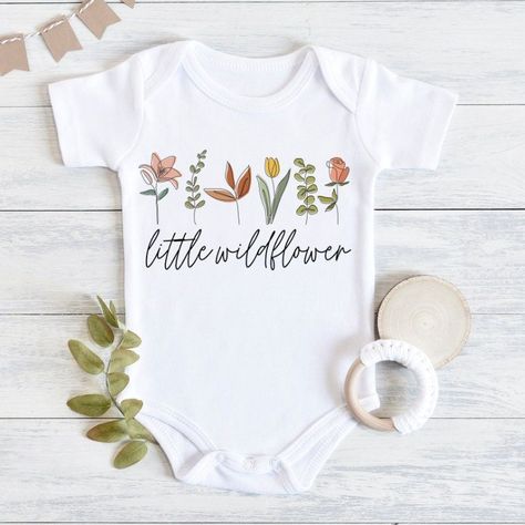 Boho Baby Shower Flower, Wildflower Baby Shower Table Decorations, Baby Girl Boho Outfits, Wildflower Baby Girl Shower Ideas, Wildflower On The Way, Baby In Bloom Wildflower Shower Ideas, Wild Flowers Baby Shower Ideas, Baby Girl Shirts Designs, A Little Wildflower Baby Shower Theme