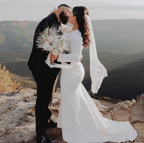 Real bride Milika looked effortlessly stunning in the VERA gown for her big day in the Blue Mountains 🤍 Congratulations to the newlyweds on their gorgeous elopement! Bridal gown: VERA gown by @noodzboutique Bride: milika.lr Celebrant: @robyncelebrant_lovemyway Photographer: @clarityphotography.krystal Makeup: @laramoussamakeup Hair: @hairbynivene Florals & planner: @thelovechapter_ #noodzboutiquebridal #nbluxebridal #realbride #realwedding #elopement #bluemountainswedding #bluemountai... Noodz Boutique, Chic Wedding Gown, Crepe Gown, The Blue Mountains, Blue Mountains, Stretch Crepe, Wedding Veil, Boat Neckline, Blue Mountain