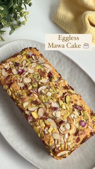 Guntas Sethi on Instagram: "✨Eggless Mawa Cake✨ Mithai or Cake🤔 Why pick one, when you can have best of both the worlds 🤪 Every bite is a heavenly blend of Indian flavours & a classic cake! Despite being eggless, it has an incredibly soft and moist texture that’s achieved with the richness of mawa (khoya) and the right blend of ingredients! Recipe: - 75 grams Butter at room temperature - ½ cup Castor Sugar - ¼ cup Yogurt/Thick Curd - 1 cup All-Purpose Flour - ½ tsp Baking Powder - ¼ tsp B Bajra Flour Cake, Mawa Cake Recipe, Ghee Cake Recipe, Eggless Butter Cake Recipe, Masala Chai Cake Recipe, Eggless Mawa Cake, Eggless Recipes, Eggless Cake, Cardamom Powder