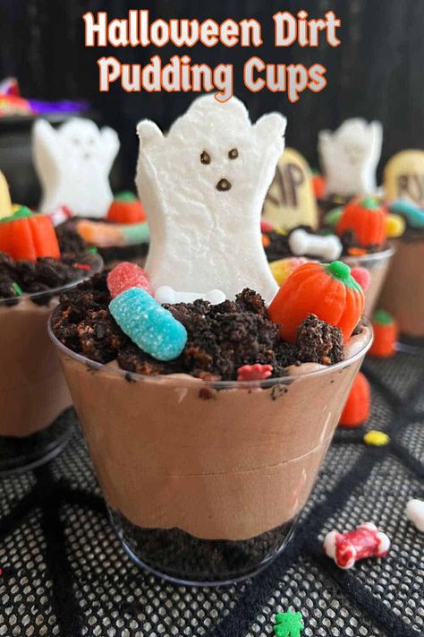 Halloween dirt cups are an easy dessert made with layers of chocolate pudding, crushed Oreos and Halloween candy. These cute graveyard cups are perfect for a Halloween party and enjoyed by kids and adults alike! via @meamel Halloween Desserts Easy Simple, Graveyard Cups, Cute Graveyard, Halloween Dirt Pudding, Halloween Dirt Cups, Halloween Dirt, Dirt Cups Recipe, Chocolate Pudding Desserts, Milano Cookies