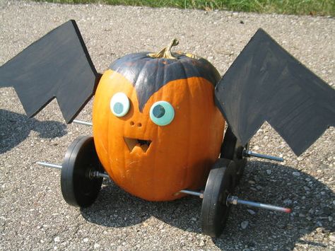 Pumpkin racers Race Car Wagon Halloween, Pumpkin Race Car Ideas, Pine Box Derby Cars, Pine Wood Derby Cars, Pinewood Derby Cars Fastest, Halloween Carnival Games, Smores Party, Halloween Group, Derby Car