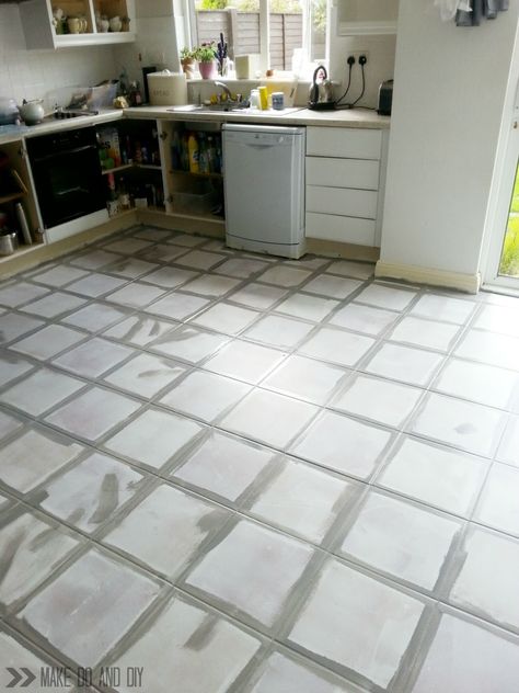 how to paint a tile floor, and what you should think about before you do! www.makedoanddiy.com How To Paint Kitchen Floor Tiles, Distressed Floor Tile, Gray Painted Tile Floor, Kitchen Tile Floor Paint, Whitewash Tile Floor, Painted Ceramic Tile Floor Kitchen, Painted Tile In Kitchen, Painted Tile Floors Kitchen, Paint Kitchen Tile Floor