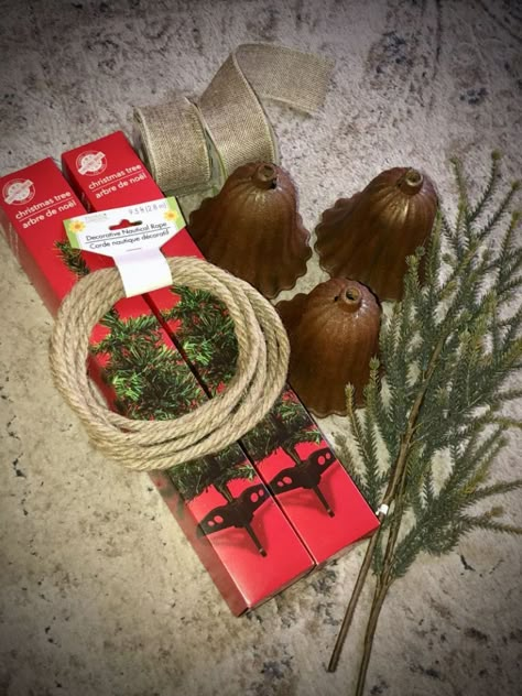 Dollar Tree Christmas Bell Makeover, Christmas Bell Swag Diy, Christmas Swags With Bells, Christmas Bell Centerpiece, Diy Dollar Tree Christmas Bells, Diy Rustic Christmas Bells, Rustic Farmhouse Christmas Decor Ideas Diy, Christmas Diy Dollar Tree Craft Ideas, Dollar Tree Swag Diy