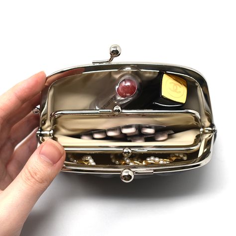 Stay organized with the Gamaguchi Purse! Handcrafted in Japan, this versatile coin purse is perfect for storing jewelry, makeup, tech accessories, and more. Discover the endless possibilities and add a touch of elegance to your daily routine. #HandmadeInJapan #CoinPurse #StylishOrganization #TravelEssentials #EverydayCarry #ChicAndFunctional #Craftsmanship #UniqueFinds #ElegantAccessories #VersatileStyle Gamaguchi Purse, Organizing Jewelry, Storing Jewelry, Inside My Bag, What In My Bag, Portable Storage, Stay Organized, Traditional Japanese, Wabi Sabi