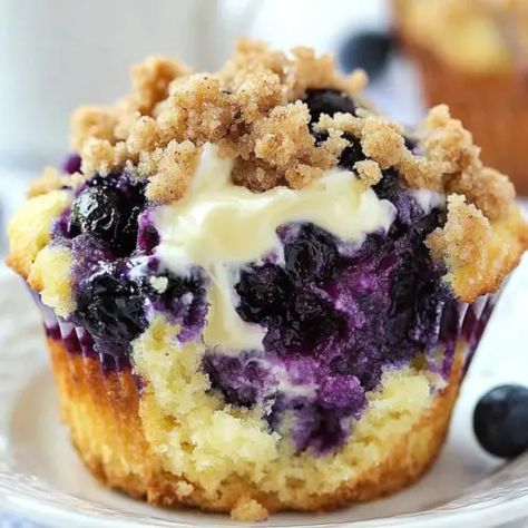 Blueberry Cream Cheese Muffins with Streusel Topping Blueberry Cheesecake Crumble Muffins, Berry Cream Cheese Muffins, Blueberry Muffins With Sour Cream, Blueberry Muffins With Crumble Topping, Blueberry Muffins With Streusel Topping, Frozen Blueberry Muffins, Strawberry Cream Cheese Muffins, Blueberry Cheesecake Muffins, Muffins With Streusel Topping