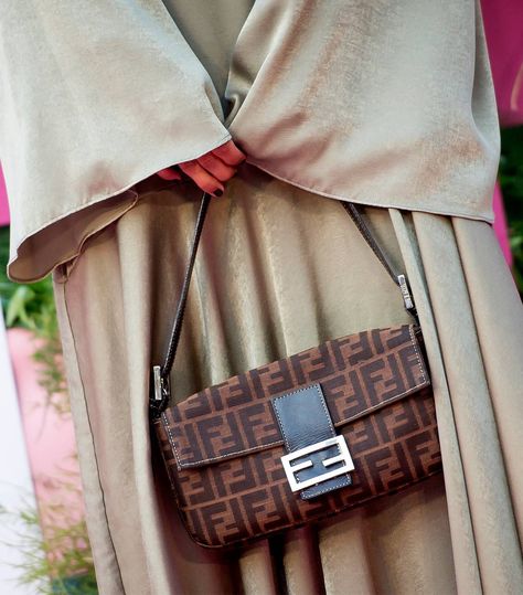 Best Fendi Bags: 8 Styles Worth Saving For | Who What Wear Vintage Fendi Baguette Outfit, Fendi Baguette Street Style, Fendi Baguette Outfit, Fendi Baguette Vintage, Hijab Jewelry, Vintage Fendi Baguette, Backpacks Designer, Fall Handbag Trends, Fall Bags Handbags