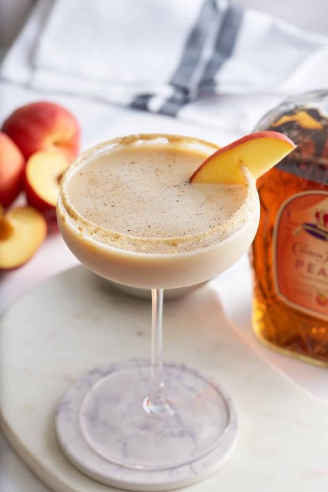 Peach Cobbler Martini, Peach Cobbler Old Fashioned Cocktail, Crown Peach Cocktail, Peach Cobbler Drink Recipe, Peach Cobbler Drink, Peach Moonshine Cocktails, Peaches And Cream Cocktail, Peach Cobbler Cocktail, Crown Peach Drinks Recipes Cocktails