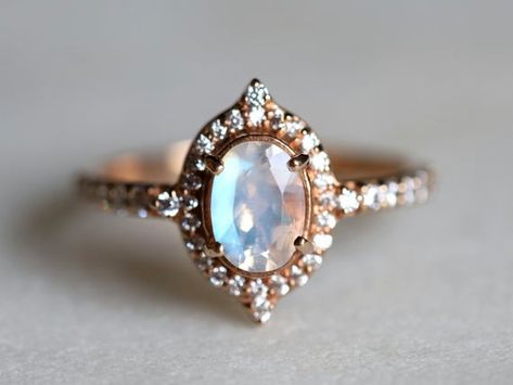 Oval Cabochon Moonstone Wedding Ring, Hallmarked Oval Moonstone Ring, Mystical Oval Moonstone Ring, Oval Hallmarked Moonstone Ring In Fine Jewelry Style, Luxury Oval Moonstone Ring Hallmarked, Antique Emerald Engagement Ring, Rainbow Moonstone Engagement Ring, Raw Diamond Engagement Rings, Raw Diamond Rings